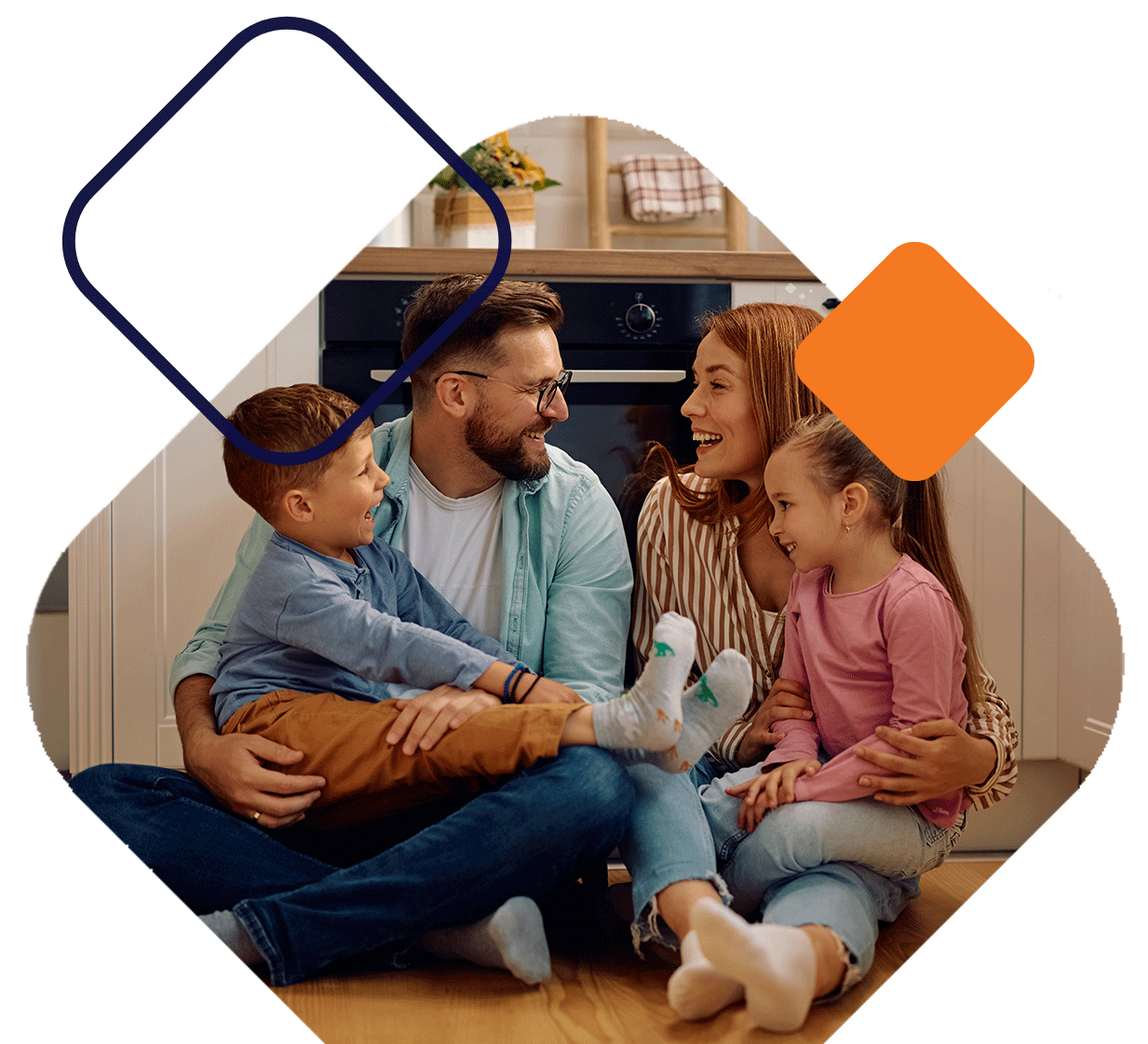 FamilySittingOnFloorInKitchen
